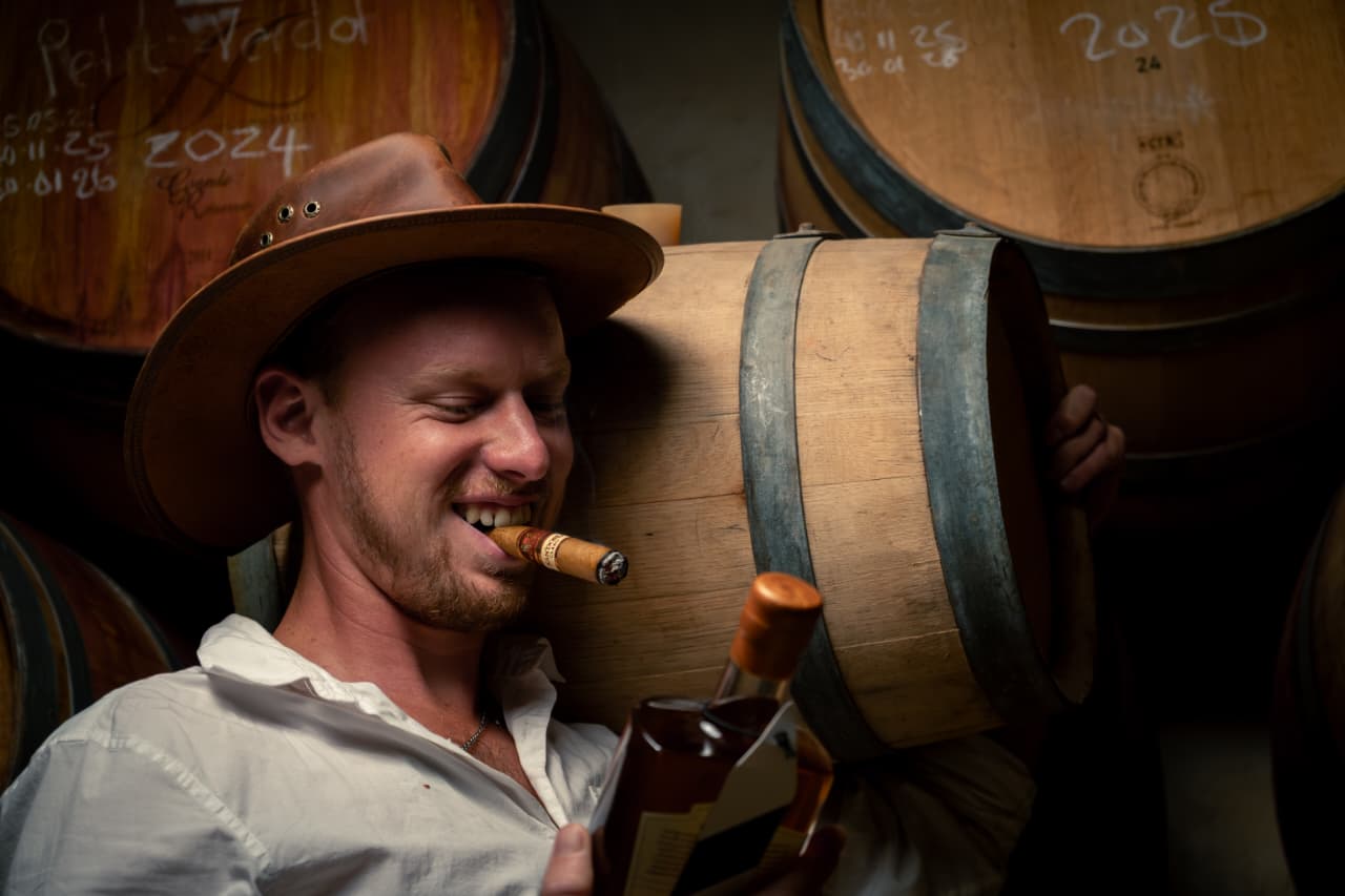 Hamish Gebers himself admiring his work while chuffing a cigar.